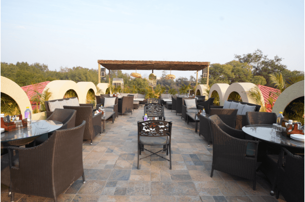 Azure's rooftop garden terrace in Panchkula, laid out for a group dinner