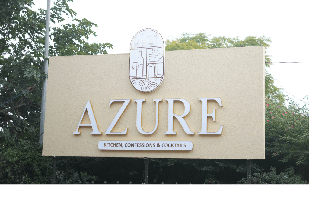 Azure's exterior signage among the greenery of Vatika Park, Panchkula